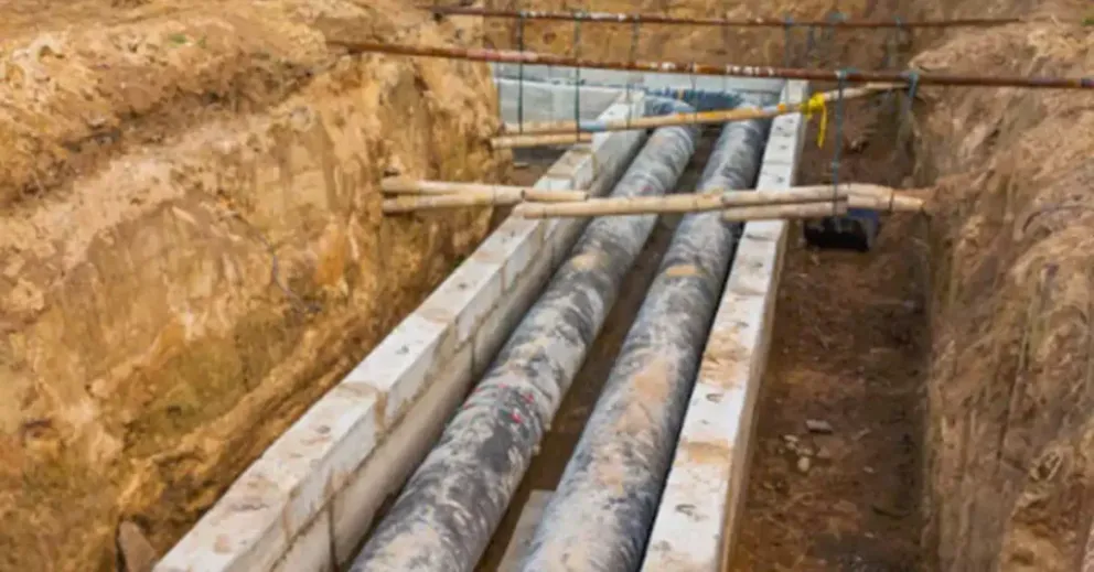 Underground utility ducts installed within a prepared trench